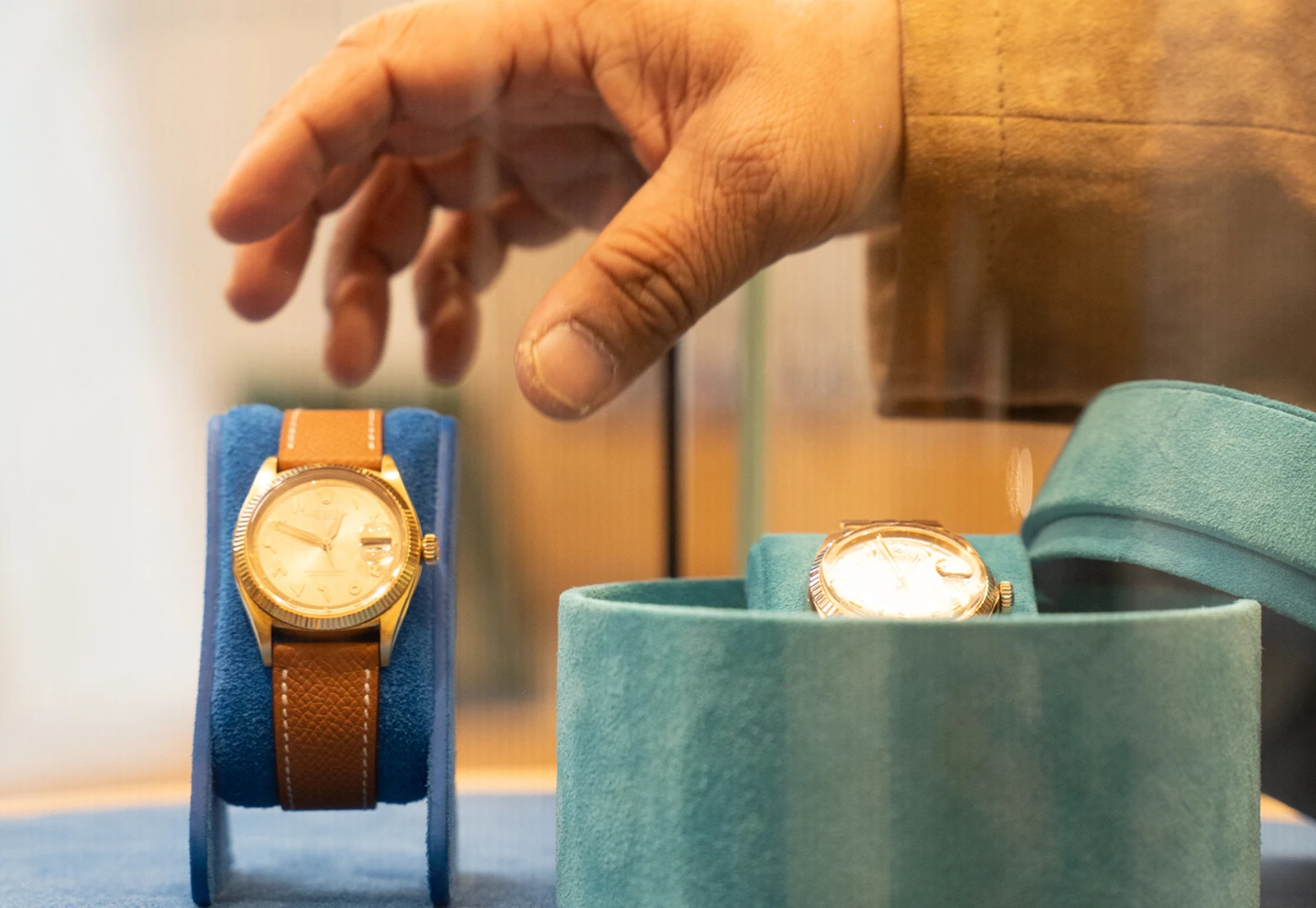 Vintage watches displayed on stands at Momentum Dubai